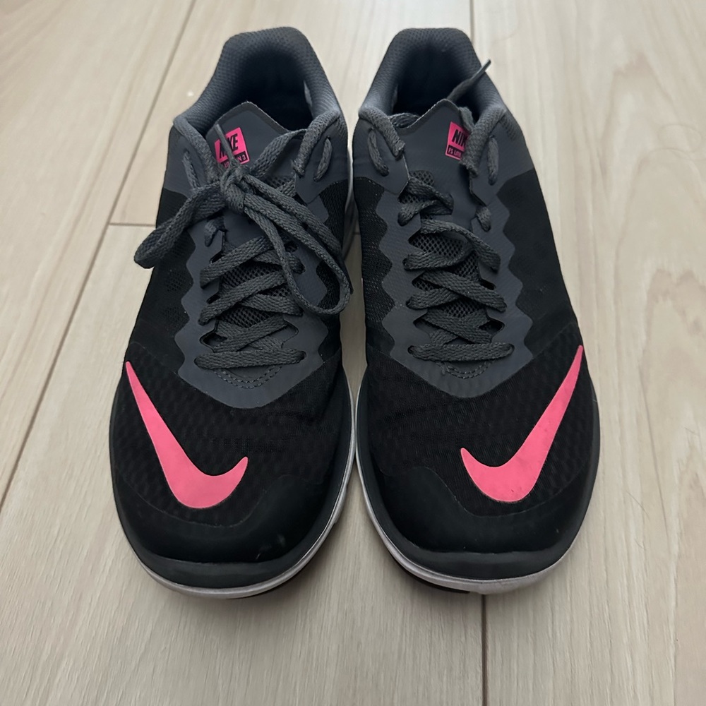 Black and pink Nike sneakers